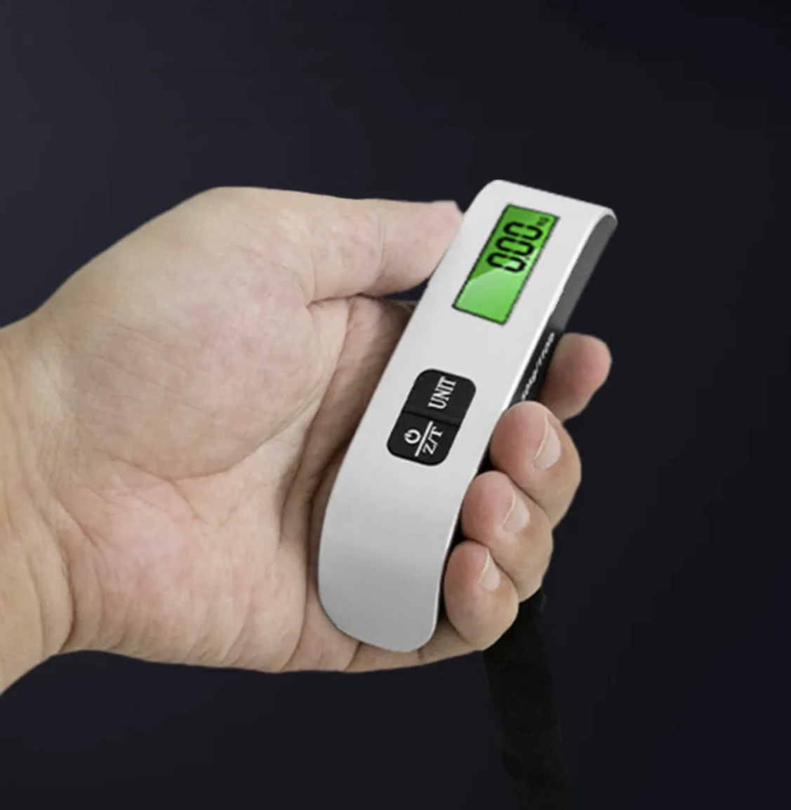 Digital luggage scale by Tech Viral To You Limited showing a 110lb LCD display and hanging strap for travel weight measurement.