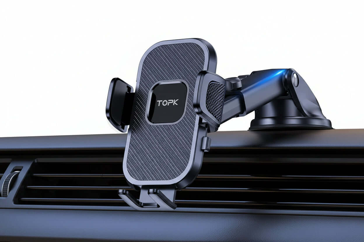 Universal car phone holder mounted on dashboard, featuring gravity design and auto-grip technology.