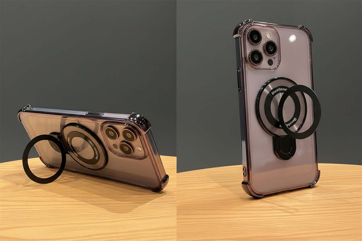 Phone case with metal ring holder showing vertical and horizontal positions on a wooden surface.