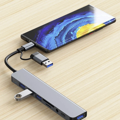 Tech Viral To You Limited 8-port USB-C hub with SD card slot, audio jack, and 100W passthrough for computers.