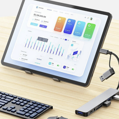 8-port USB-C hub by Tech Viral To You Limited with SD card slot, audio jack, and 100W passthrough for computer accessories.