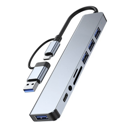 Tech Viral To You Limited 8-Port USB-C Hub with SD card slot, audio jack, and 100W passthrough for computer accessories.