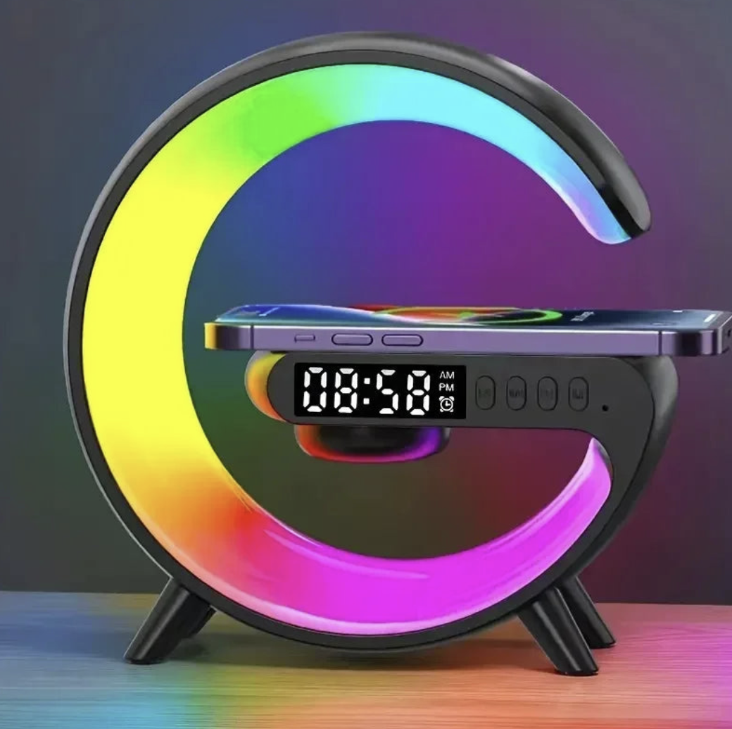 Wireless charger stand with RGB alarm clock display and Bluetooth speaker functionality, designed for convenient device charging.