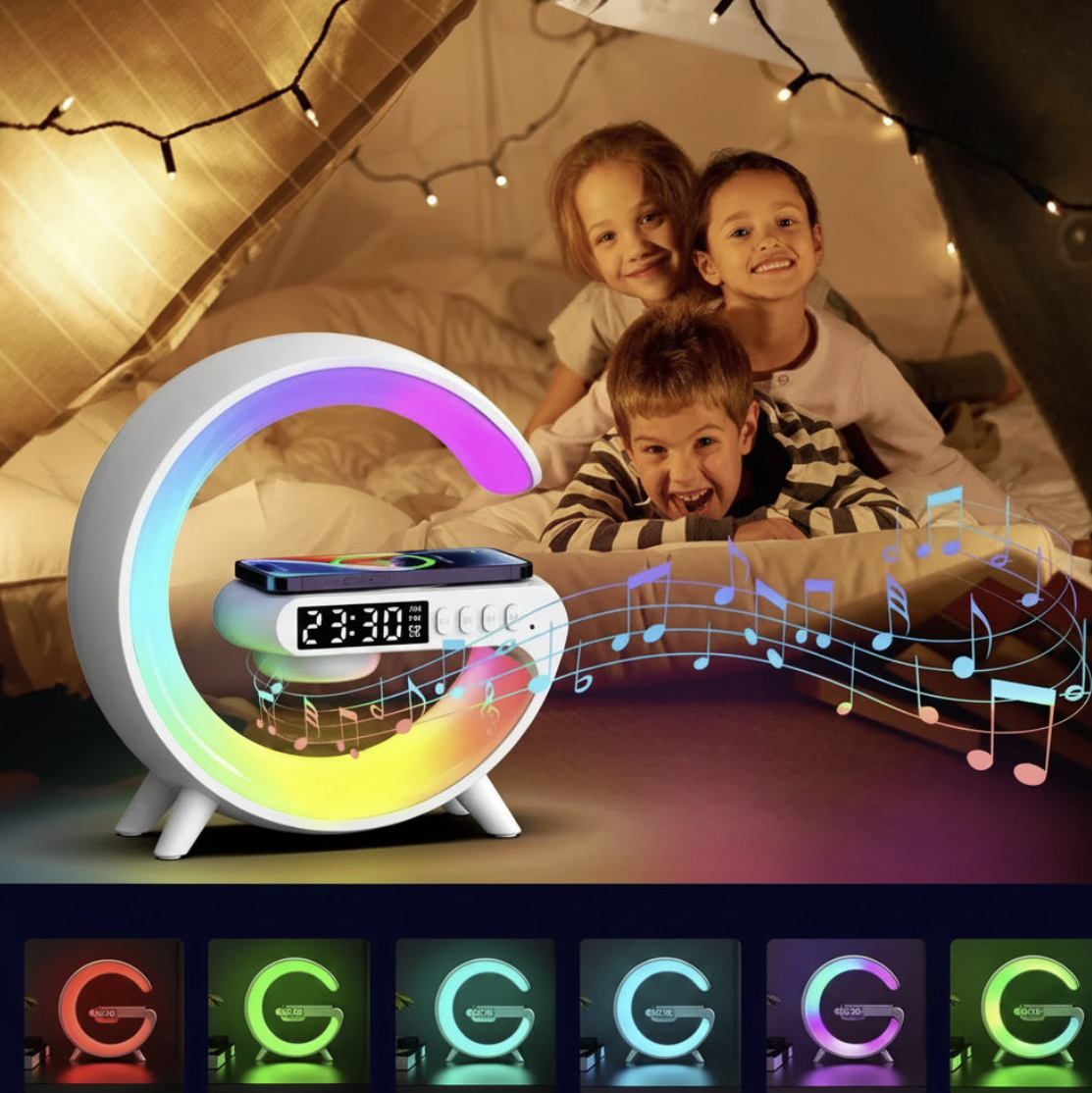 Wireless charger stand with RGB alarm clock and Bluetooth speaker, designed for convenient charging and multimedia use.