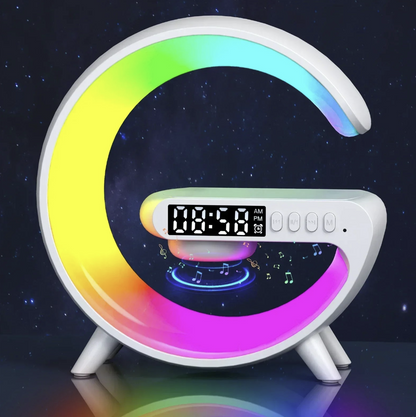 Wireless charger stand with RGB alarm clock and Bluetooth speaker, sleek design for convenient device charging and audio playback.