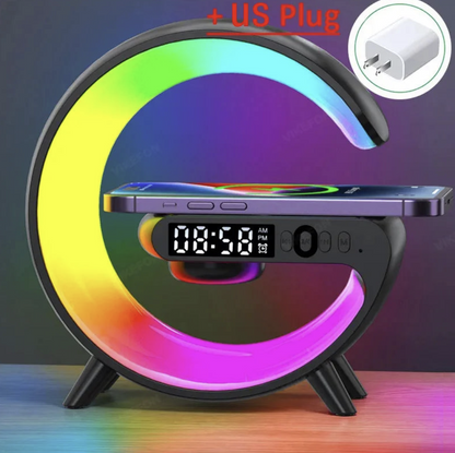 Wireless charger stand with RGB alarm clock and Bluetooth speaker, featuring sleek design and functional charging station.