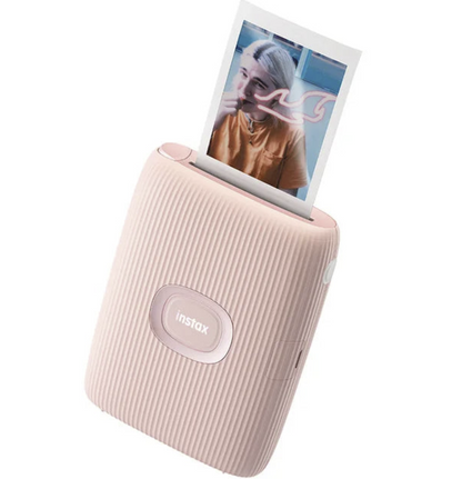 Wireless Mini Photo Printer by Tech Viral To You Limited printing a colorful photo from a smartphone screen.