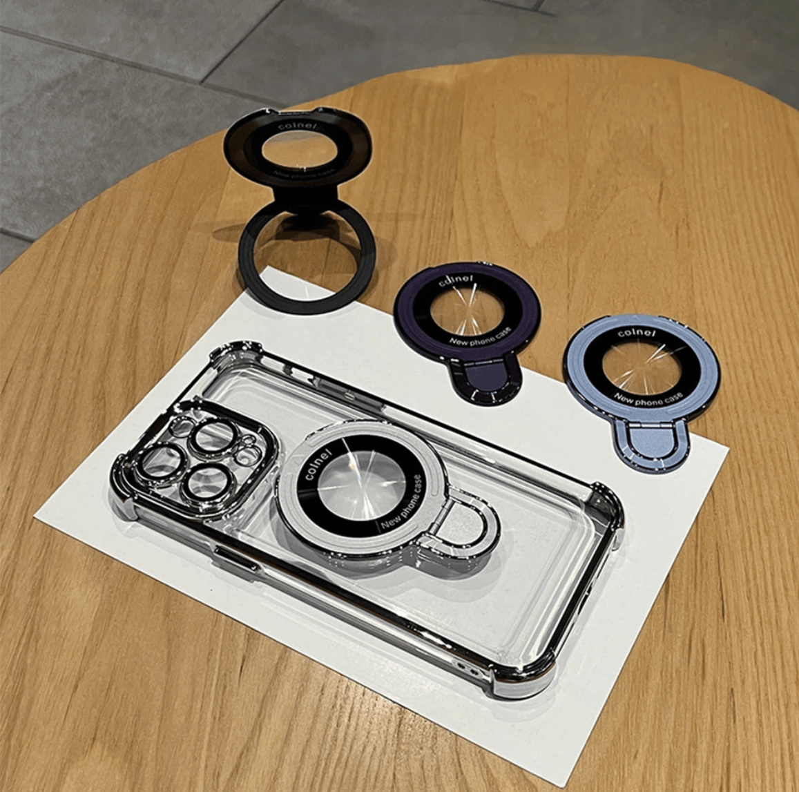 Phone camera lens protector on a wooden table