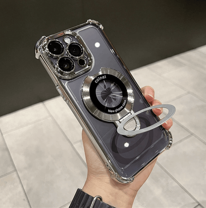 Phone case with ring holder held by a hand on a tiled floor.