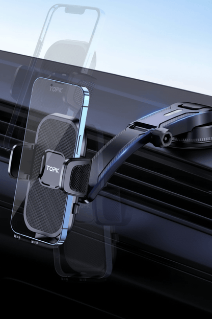 Universal car phone holder with gravity mount design securely holding a smartphone on a dashboard.