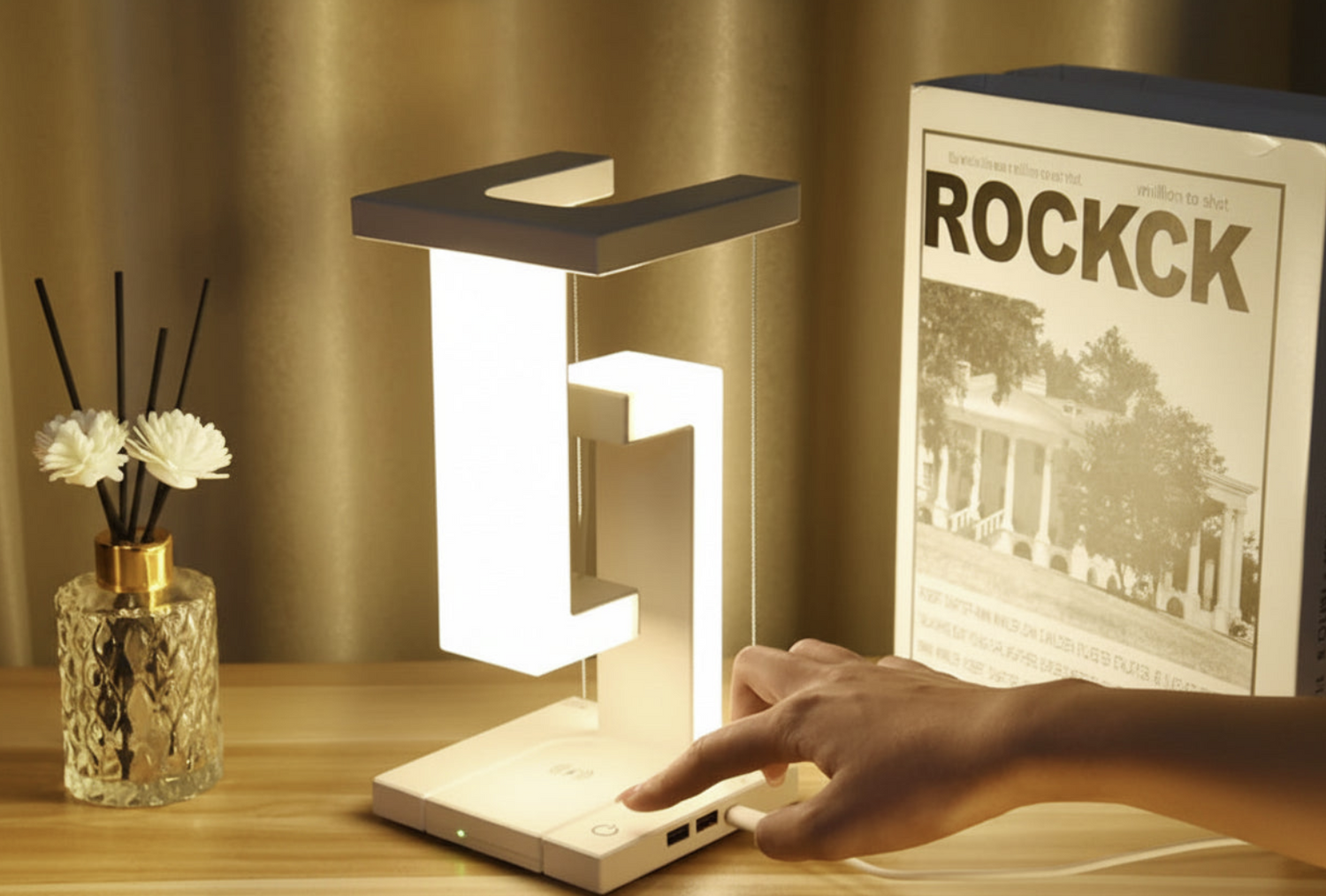 Levitating desk lamp with 10W wireless charger by OT Lifestyle Store, showcasing a modern floating lighting design.
