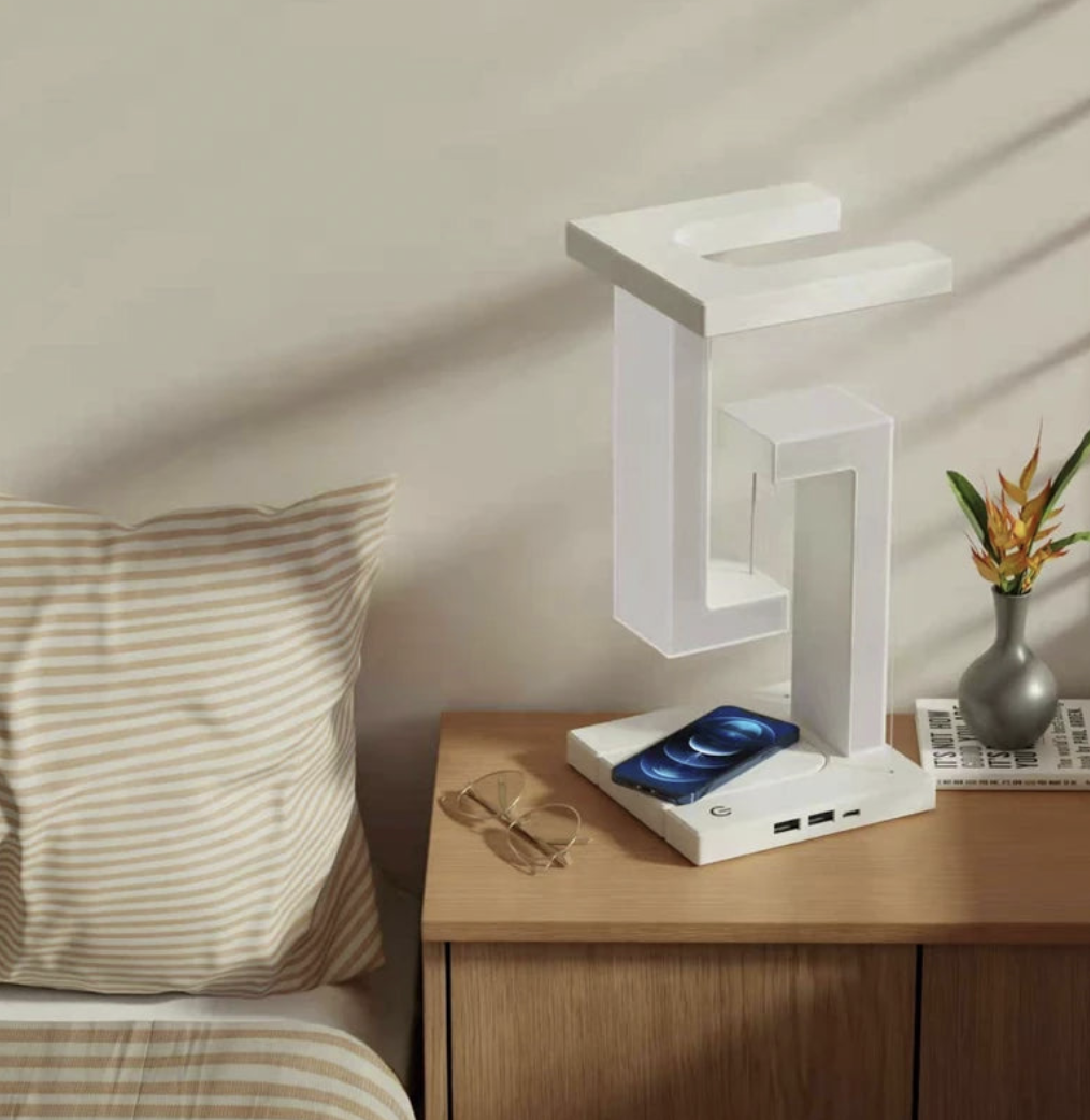 Levitating desk light with floating design and 10W wireless charger, modern OT Lifestyle Store lighting fixture.
