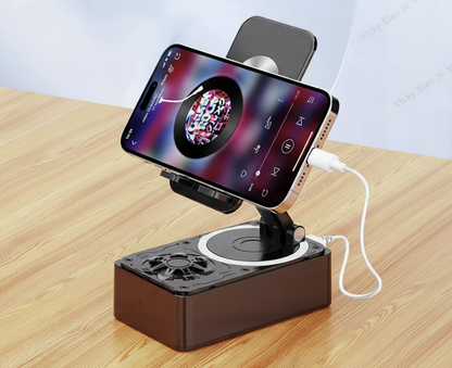 Vicky Xiao 3C Store 3-in-1 Bluetooth speaker with phone stand and power bank, showcasing compact design and connectivity features.