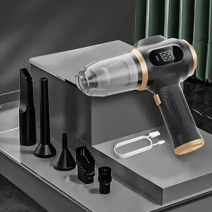 Handheld vacuum cleaner with attachments on a gray surface